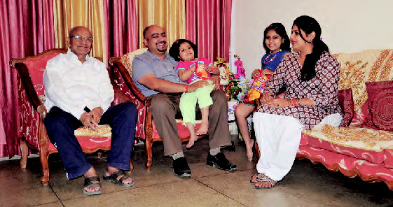 HOUSE PROUD: The Sonis share a light moment at their Divender Vihar residence