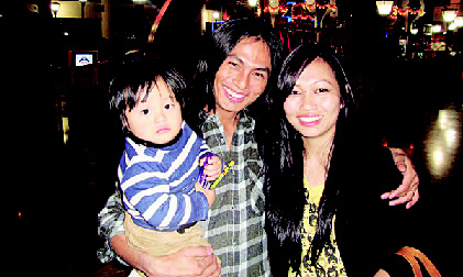 THREE IN TUNE: Jimmy Thang with his wife Daisy and son Jonathan