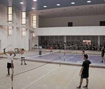In the absence of a coach, players train themselves in badminton tactics and techniques